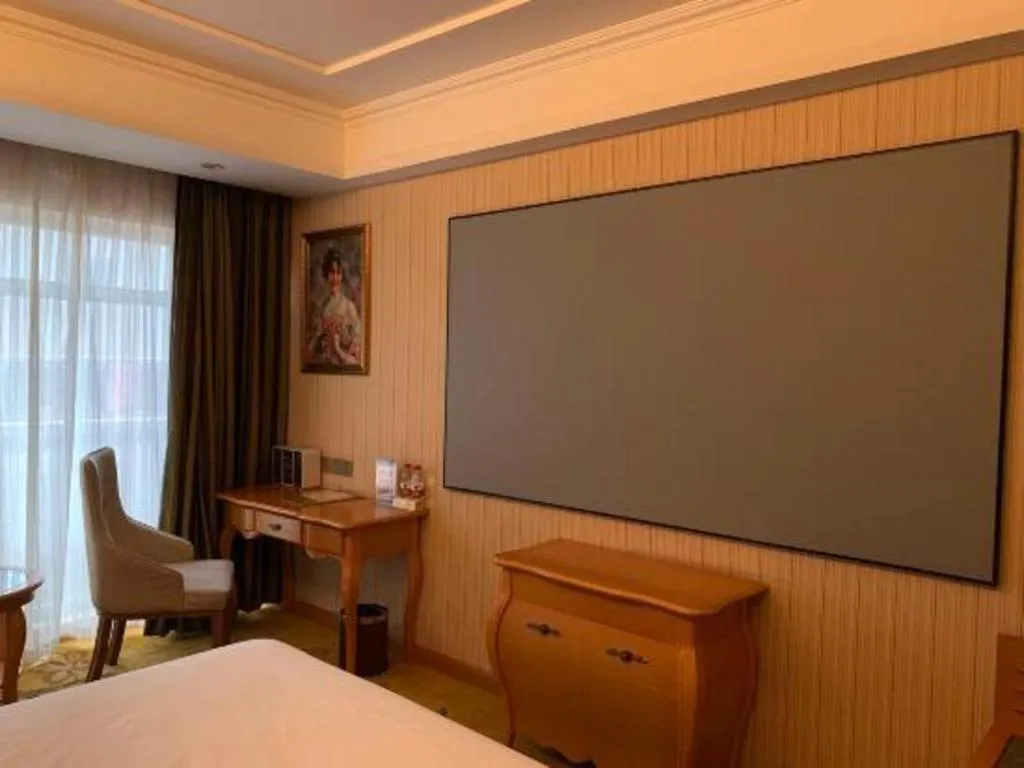 Bed in Vienna Hotel Hebei Cangzhou Mingzhu Market