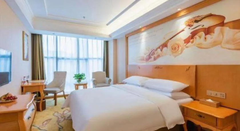 Bed in Vienna Hotel Hebei Cangzhou Mingzhu Market