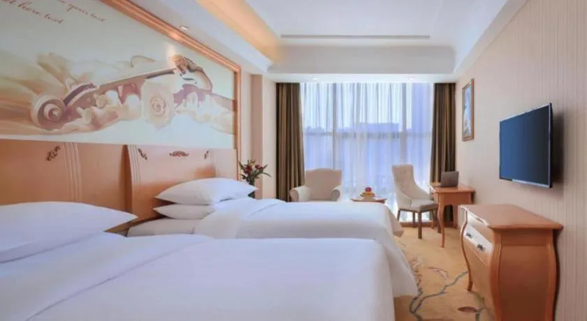 Bed in Vienna Hotel Hebei Cangzhou Mingzhu Market