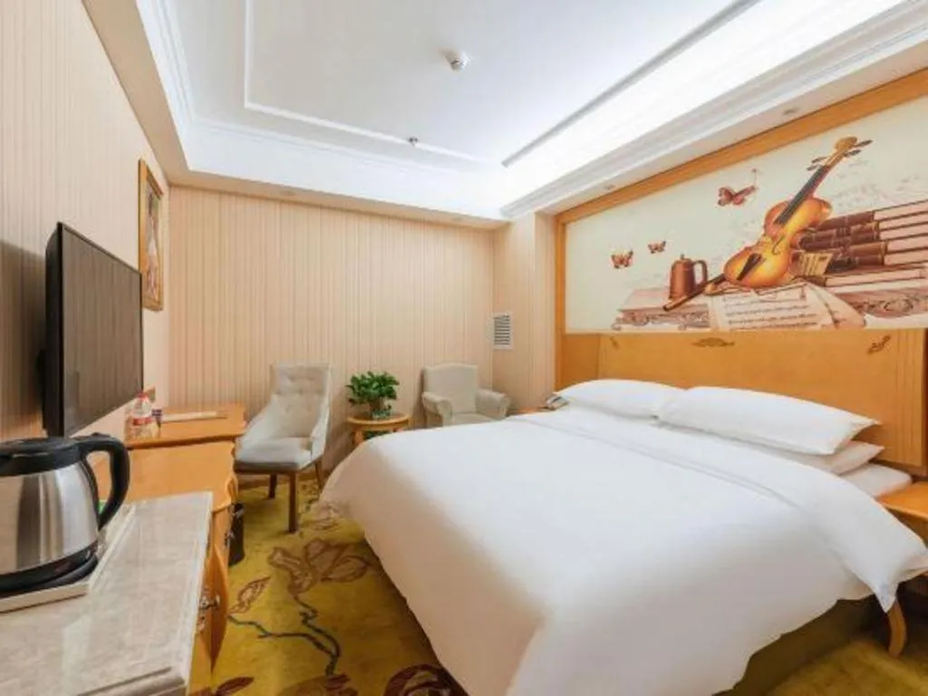 Bed in Vienna Hotel Hebei Cangzhou Mingzhu Market