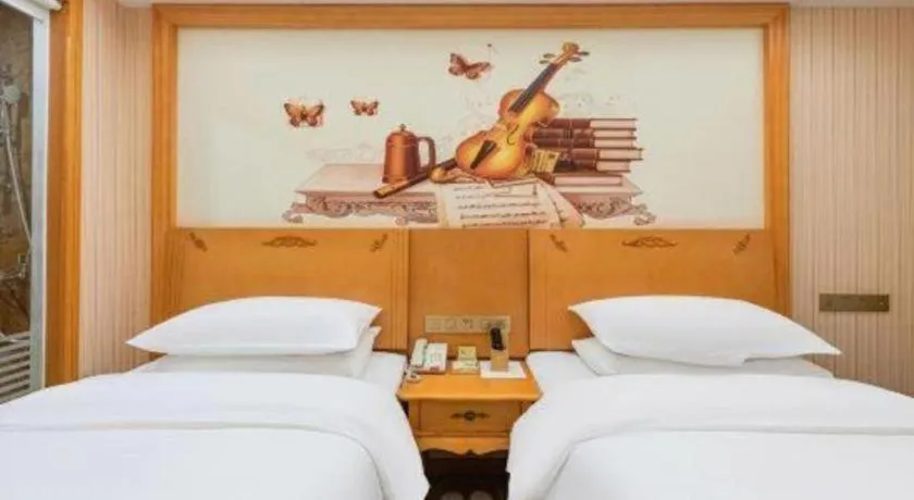 Bed in Vienna Hotel Hebei Cangzhou Mingzhu Market