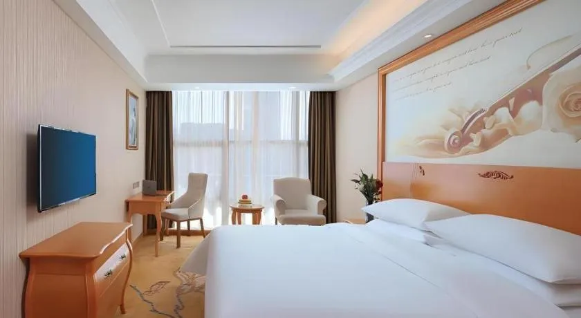 Bed in Vienna Hotel Hebei Cangzhou Mingzhu Market