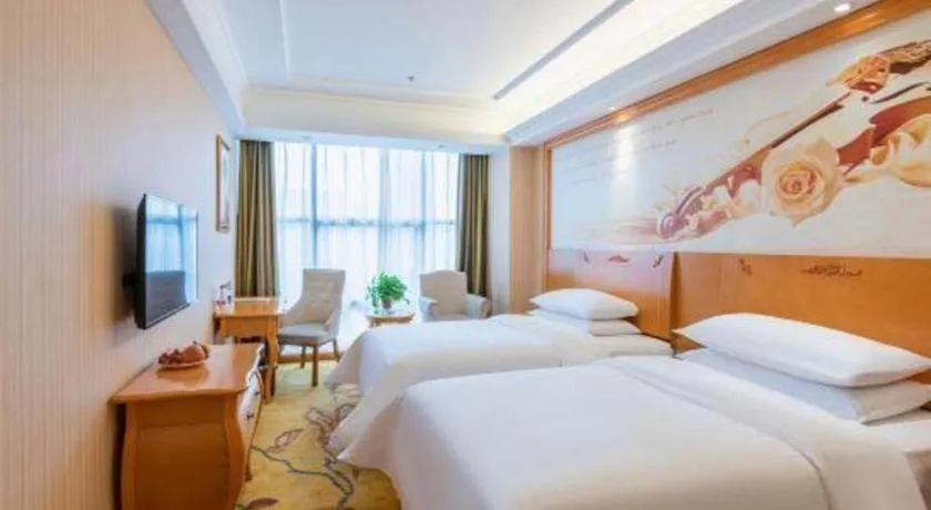 Bed in Vienna Hotel Hebei Cangzhou Mingzhu Market