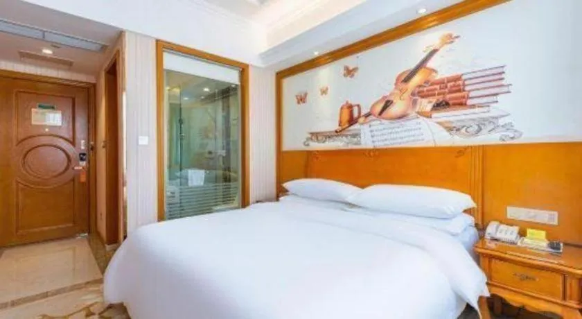 Bed in Vienna Hotel Hebei Hengshui High-Speed Railway Station