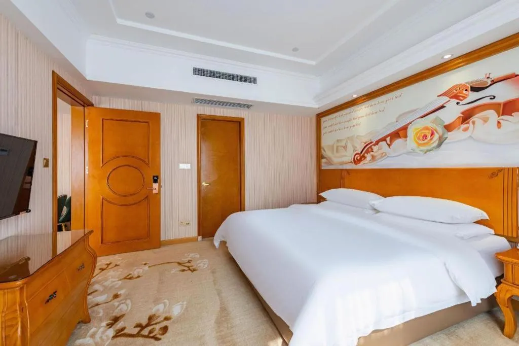 Bed in Vienna Hotel Hebei Hengshui High-Speed Railway Station
