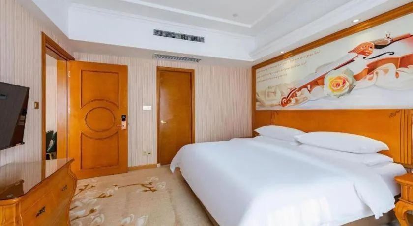 Bed in Vienna Hotel Hebei Hengshui High-Speed Railway Station