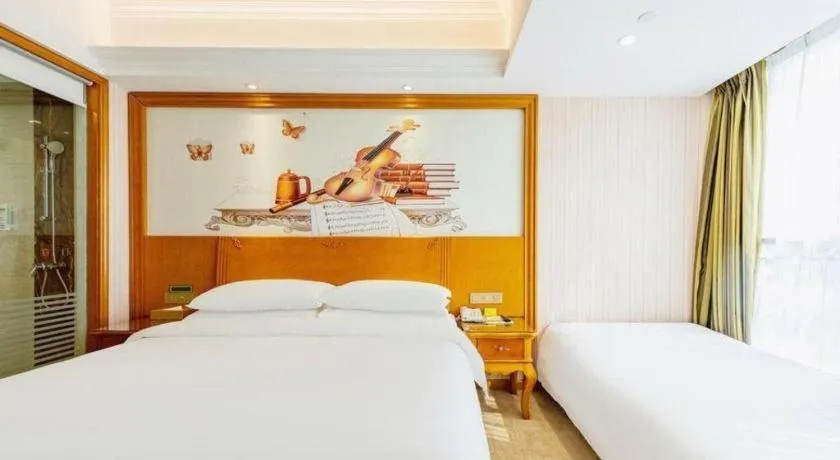 Bed in Vienna Hotel Hebei Hengshui High-Speed Railway Station