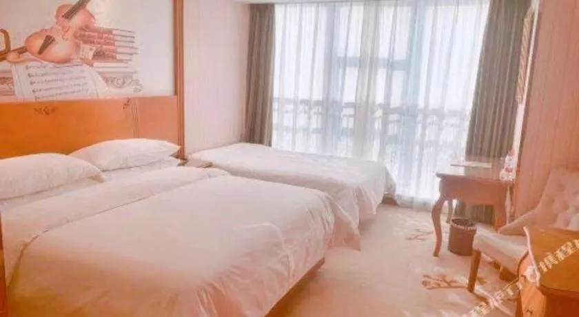 Bed in Vienna Hotel Hebei Hengshui High-Speed Railway Station