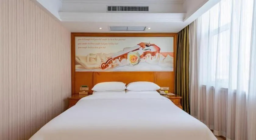 Bed in Vienna Hotel Hebei Hengshui High-Speed Railway Station