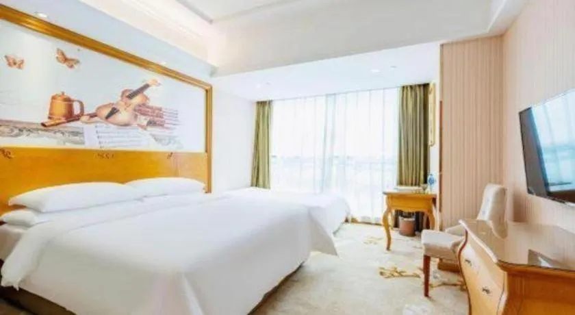 Bed in Vienna Hotel Hebei Hengshui High-Speed Railway Station