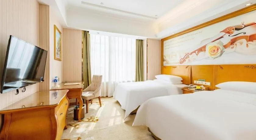 Bed in Vienna Hotel Hebei Hengshui High-Speed Railway Station