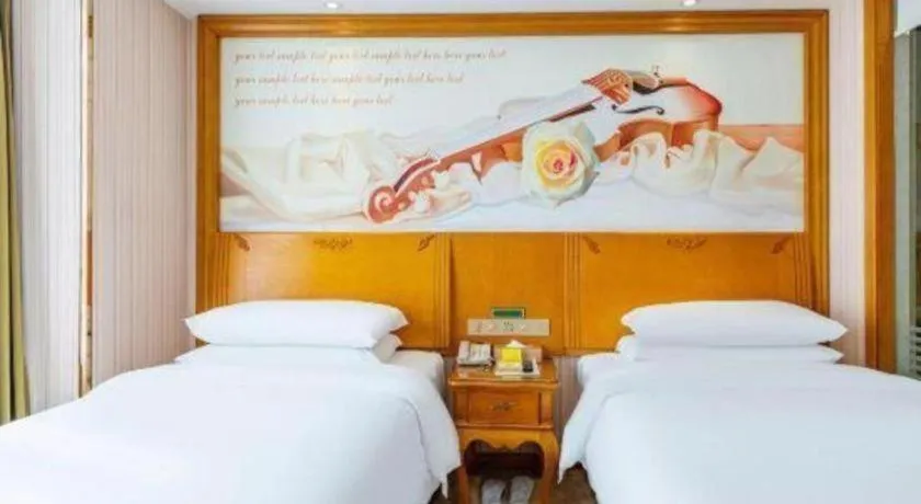 Bed in Vienna Hotel Hebei Hengshui High-Speed Railway Station