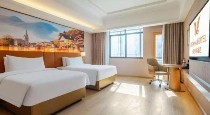 Bed in Vienna Hotel Hunan Jishou Fenghuang Ancient City