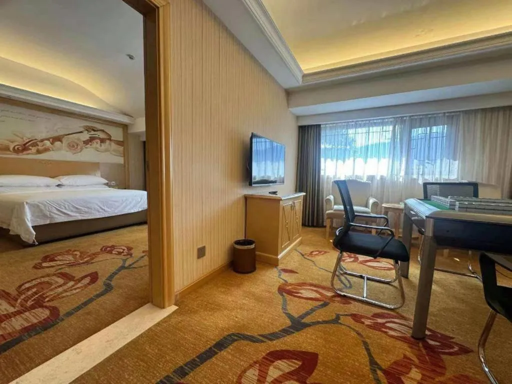 Bed in Vienna Hotel Hunan Jishou Fenghuang Ancient City