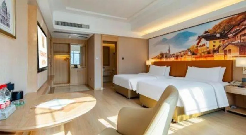 Bed in Vienna Hotel Hunan Jishou Fenghuang Ancient City