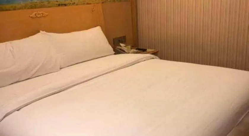 Bed in Vienna Hotel Hunan Jishou Fenghuang Ancient City