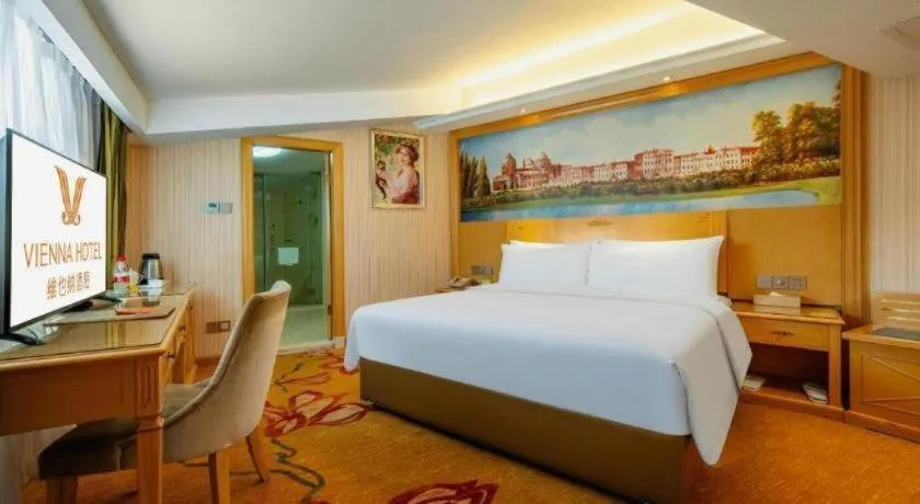 Bed in Vienna Hotel Hunan Jishou Fenghuang Ancient City