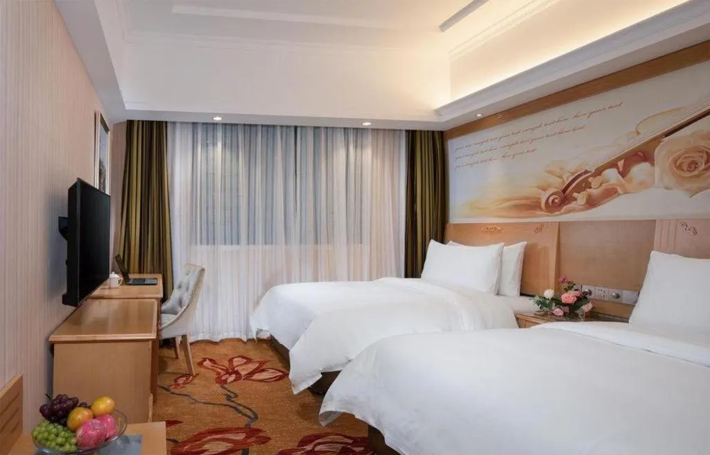 Bed in Vienna Hotel Hunan Jishou Fenghuang Ancient City