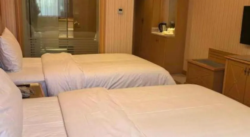 Bed in Vienna Hotel Hunan Jishou Fenghuang Ancient City