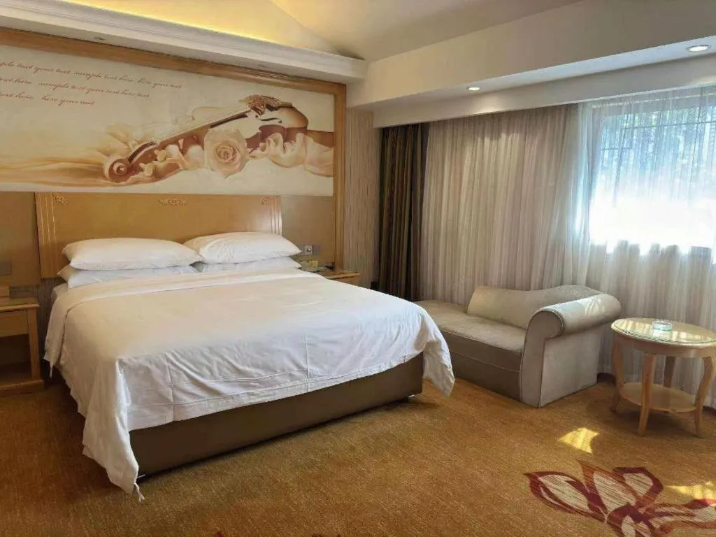 Bed in Vienna Hotel Hunan Jishou Fenghuang Ancient City