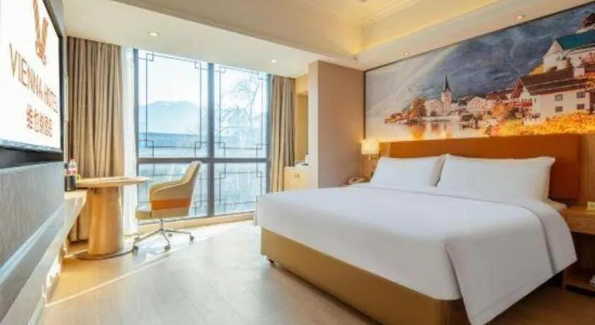 Bed in Vienna Hotel Hunan Jishou Fenghuang Ancient City