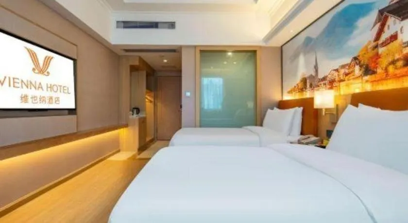 Bed in Vienna Hotel Hunan Jishou Fenghuang Ancient City