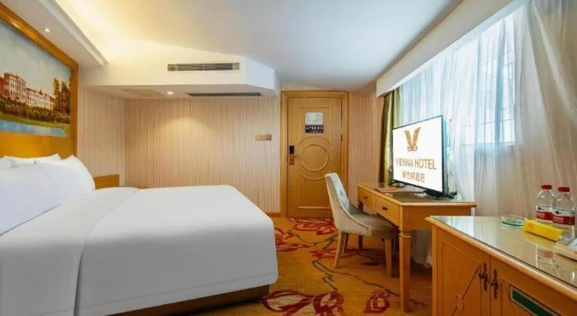 Bed in Vienna Hotel Hunan Jishou Fenghuang Ancient City