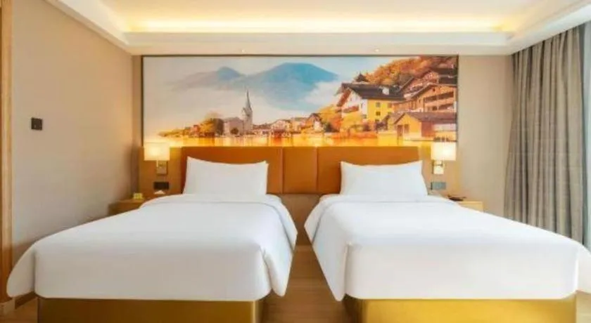 Bed in Vienna Hotel Hunan Jishou Fenghuang Ancient City