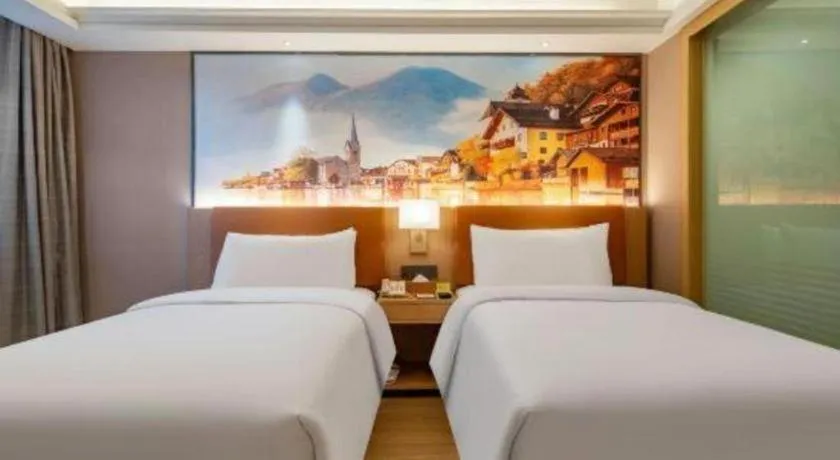 Bed in Vienna Hotel Hunan Jishou Fenghuang Ancient City