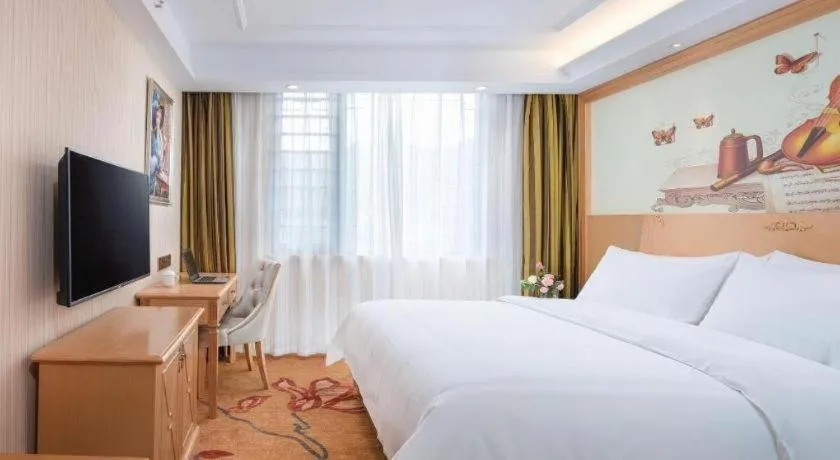 Bed in Vienna Hotel Hunan Jishou Fenghuang Ancient City