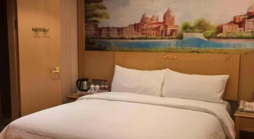 Bed in Vienna Hotel Hunan Jishou Fenghuang Ancient City