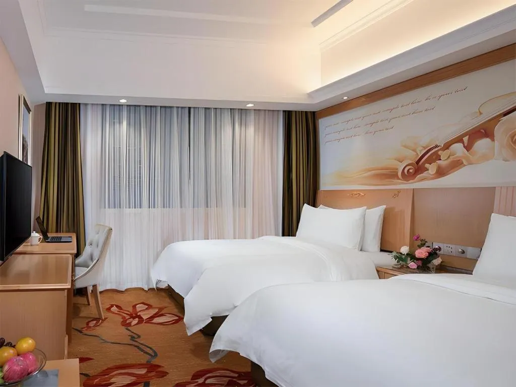 Bed in Vienna Hotel Hunan Jishou Fenghuang Ancient City