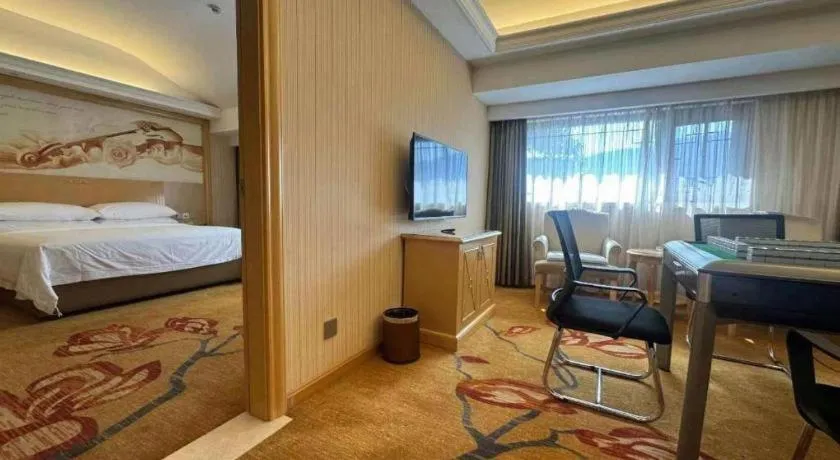 Bed in Vienna Hotel Hunan Jishou Fenghuang Ancient City