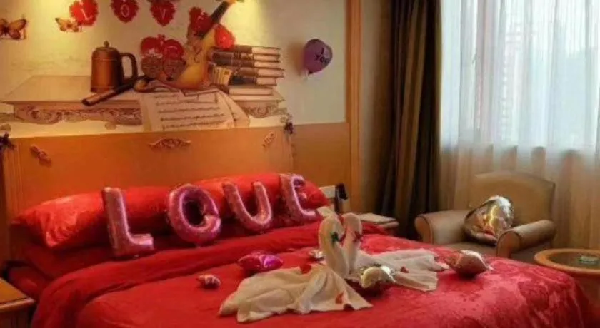 Bed in Vienna Hotel Hunan Jishou Fenghuang Ancient City