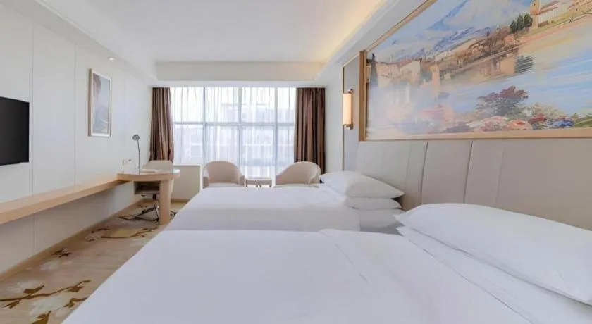 Bed in Vienna Hotel Guangdong Shantou Chaoyang Heping