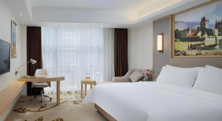Bed in Vienna Hotel Guangdong Shantou Chaoyang Heping