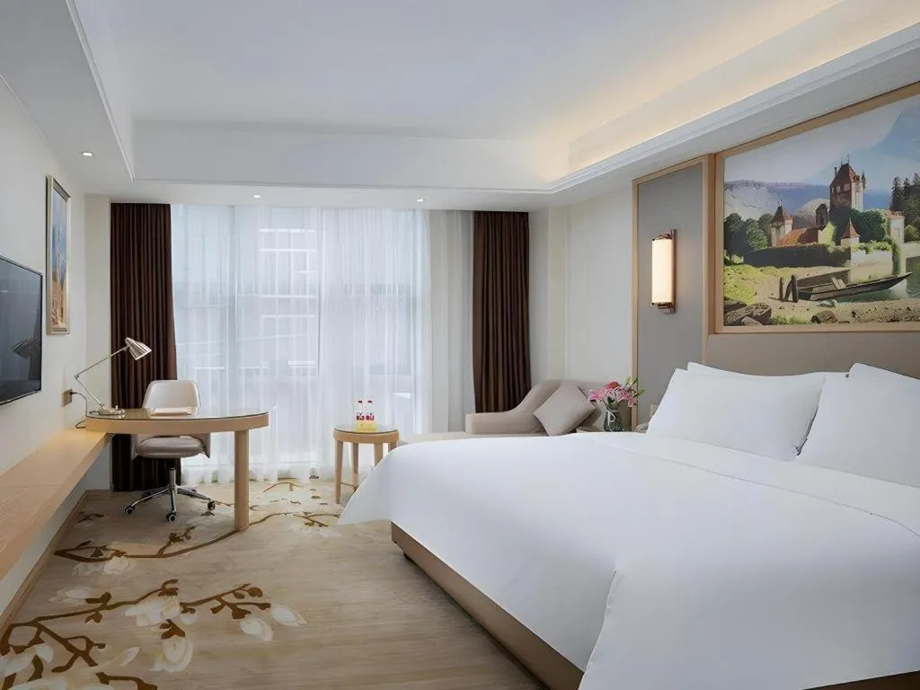 Bed in Vienna Hotel Guangdong Shantou Chaoyang Heping