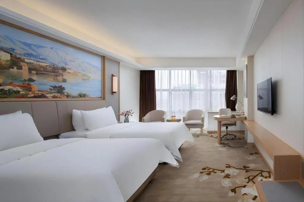 Bed in Vienna Hotel Guangdong Shantou Chaoyang Heping