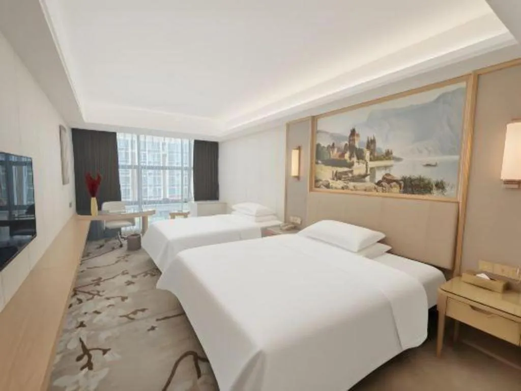 Bed in Vienna Hotel Guangdong Shantou Chaoyang Heping