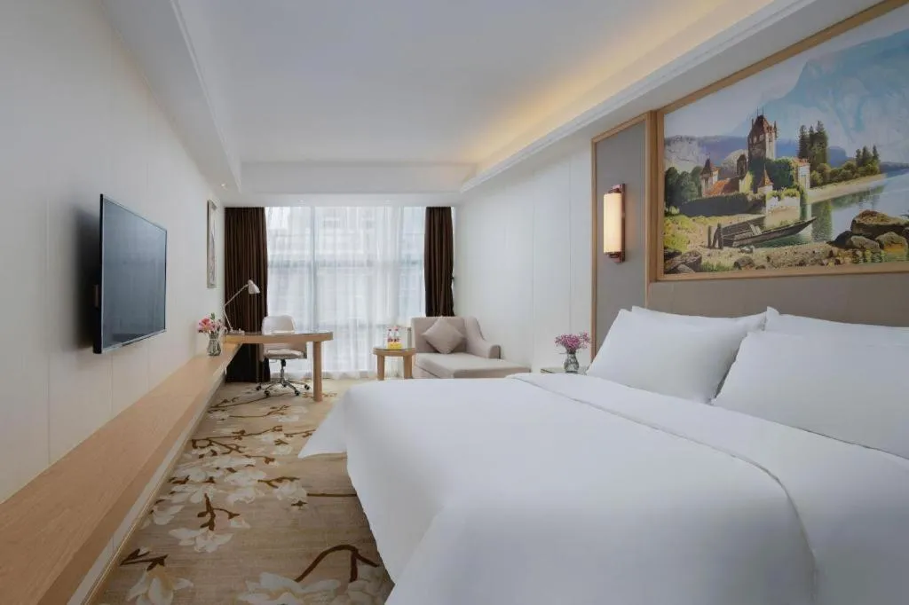 Bed in Vienna Hotel Guangdong Shantou Chaoyang Heping