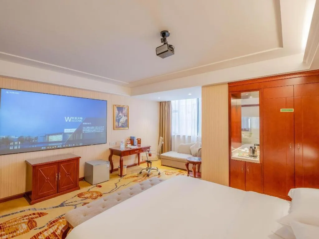 Bed in Vienna Hotel Guangdong Zhongshan Ancient Town Lighting Expo Center