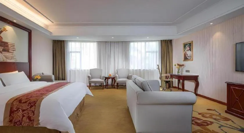 Bed in Vienna Hotel Guangdong Zhongshan Ancient Town Lighting Expo Center