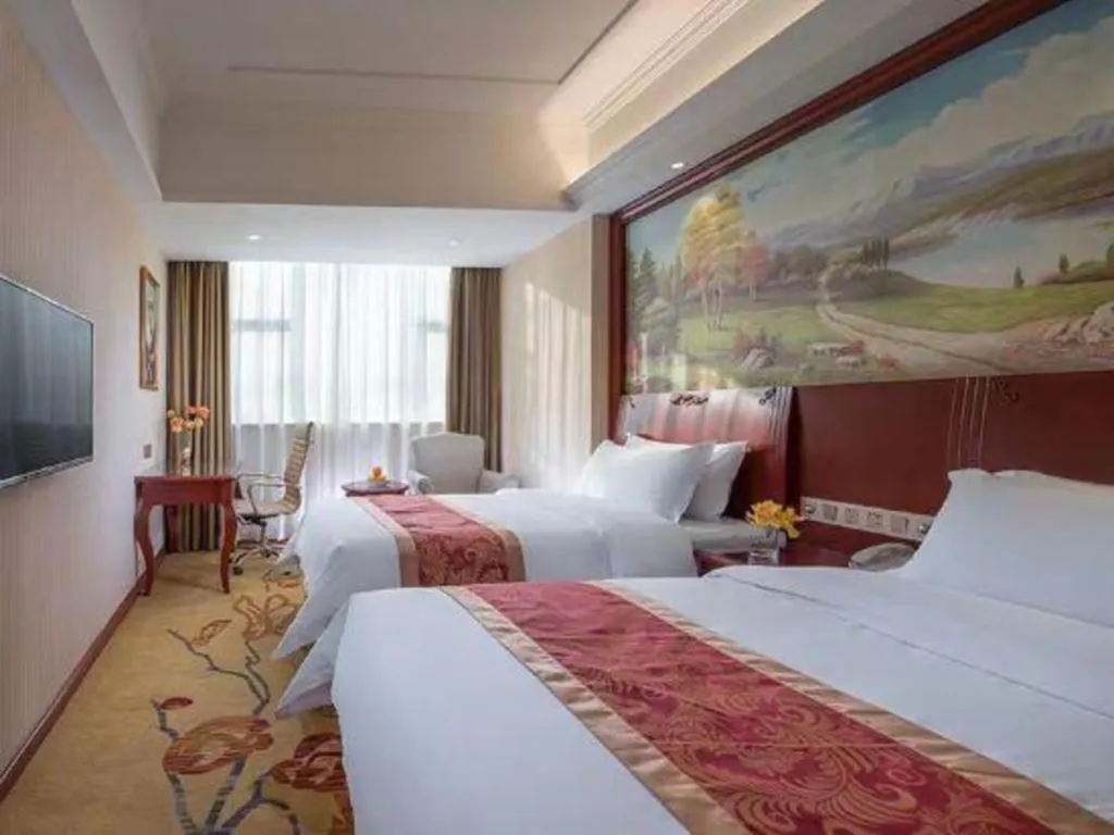 Bed in Vienna Hotel Guangdong Zhongshan Ancient Town Lighting Expo Center