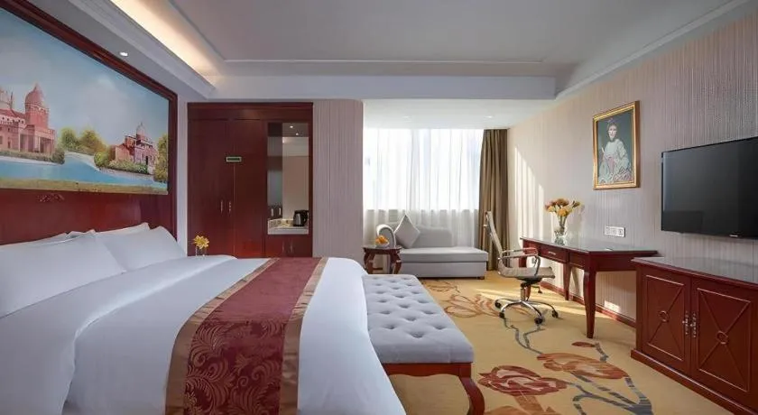 Bed in Vienna Hotel Guangdong Zhongshan Ancient Town Lighting Expo Center