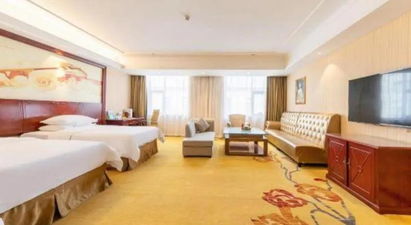 Bed in Vienna Hotel Guangdong Zhongshan Ancient Town Lighting Expo Center