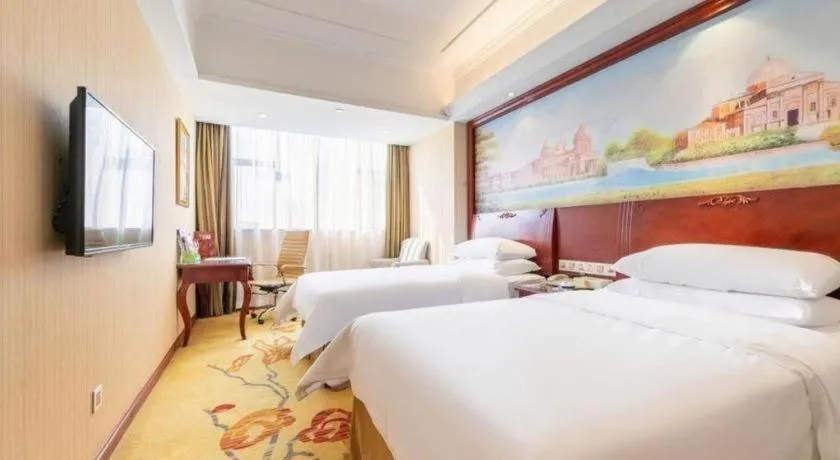 Bed in Vienna Hotel Guangdong Zhongshan Ancient Town Lighting Expo Center