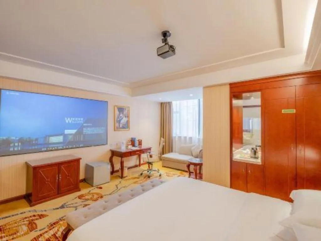 Bed in Vienna Hotel Guangdong Zhongshan Ancient Town Lighting Expo Center