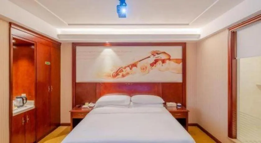 Bed in Vienna Hotel Guangdong Zhongshan Ancient Town Lighting Expo Center