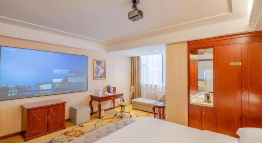 Bed in Vienna Hotel Guangdong Zhongshan Ancient Town Lighting Expo Center