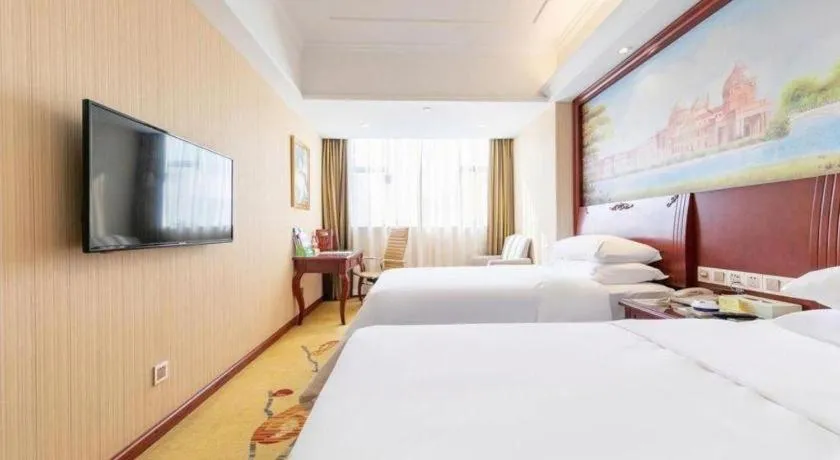 Bed in Vienna Hotel Guangdong Zhongshan Ancient Town Lighting Expo Center